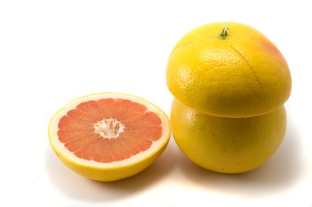 Cuted frsh grapefruits on the white backgroundの写真素材