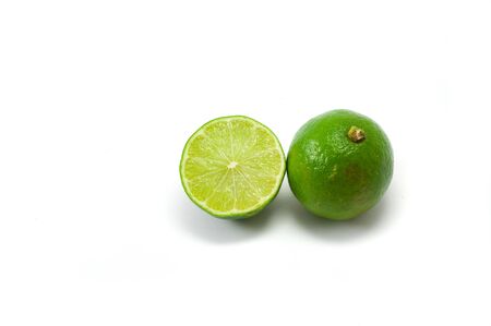 Two fresh limes on the white backgroundの写真素材