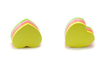 Composition with two colored hearts on the white backgroundの写真素材