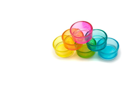 Colored transperented candle holders on white backgroundの写真素材