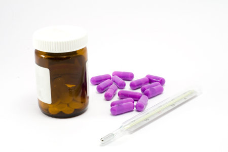 ?olored pills in white background,  violet toneの写真素材