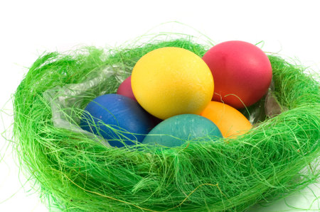 This image shows a basket full of colorful Easter eggs.