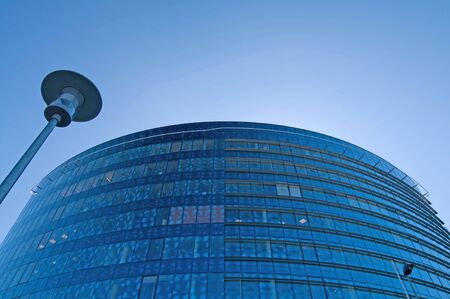 A corporate building against the blue skyの写真素材