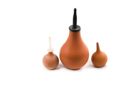 Shot of three enemas isolated on whiteの写真素材