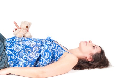 Portrait of pretty pregnant woman with toyの写真素材