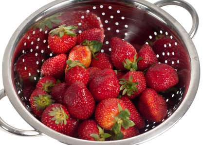 Strawberries in strainerの写真素材