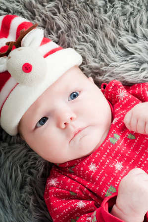 Little cute baby in redの写真素材