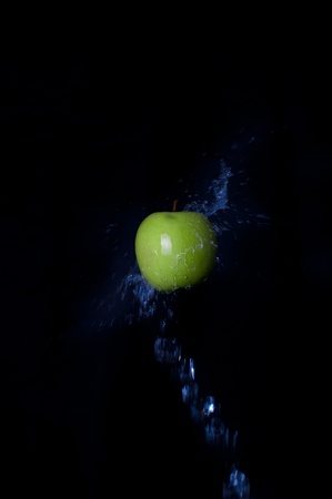 Apple and splashの写真素材