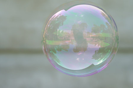 Soap bubble on greay background