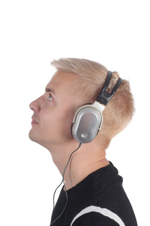 Man in headphones isolated on white, photo in profileの写真素材