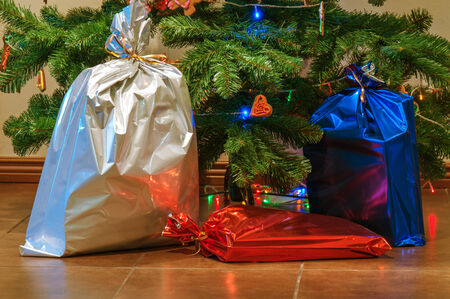 Christmas presents under the treeの写真素材