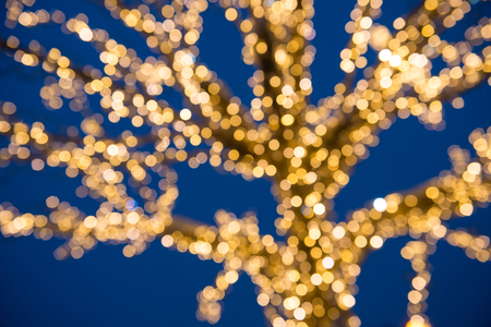 Blurred golden lights Christmas Treeの写真素材