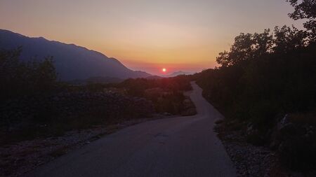 Scenic view of beautiful sunset above Biokovo mountain nature parkの写真素材