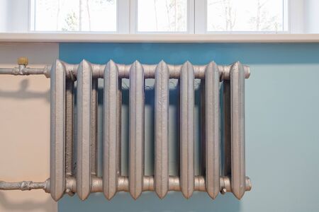 Cast iron radiator of water on the wallの写真素材