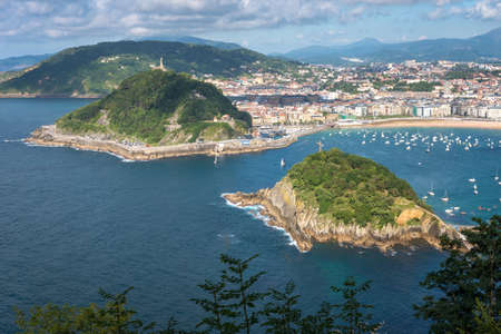 SAN SEBASTIAN, SPAIN- JULY 13, 2020: Aerial view of San Sebastian and Santa Clara Island, Donostia, Spain on a beautiful summer dayの写真素材