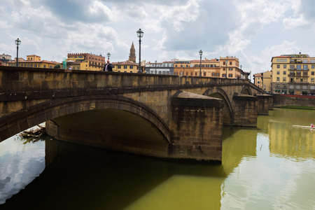 FLORENCE, ITALY - APRIL 24, 2019: View of the historic buildings in Florence. Reflection in the riverのeditorial素材