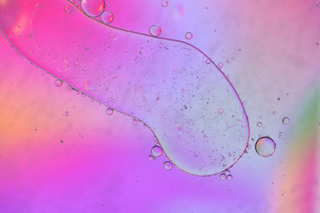 Pink abstract background picture made with oil, water and soap