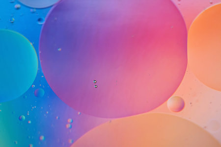 Colorful abstract background with oil drops on water