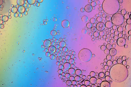 Colorful abstract background with oil drops on water
