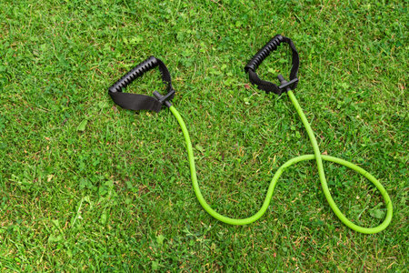 Fit tube on the green grass background