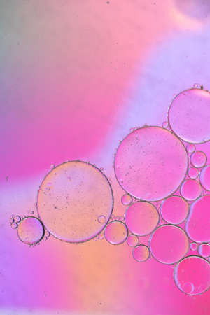 Pink abstract background picture made with oil, water and soapの写真素材