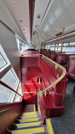 Inside red London bus view: down the bus stairsの写真素材