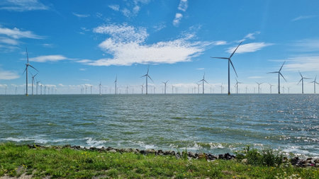Vast water body with windmillsの写真素材