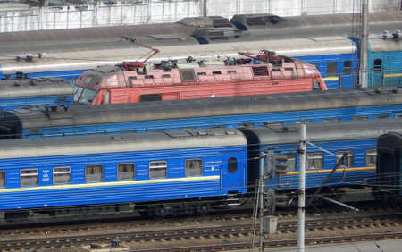 Locomotive and trains at the railway stationの写真素材
