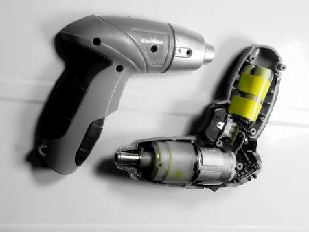 Disassembled electric screwdriver cutaway studio shotの写真素材