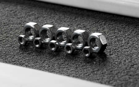 Lines of screw nuts studio isolatedの写真素材