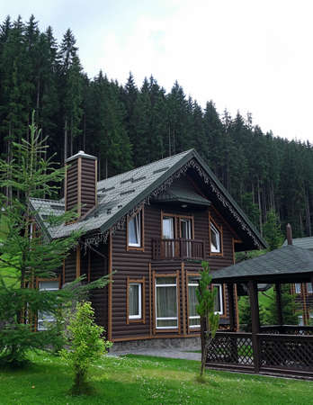 Country cottage with wooden arbor at the mountain health resortのeditorial素材