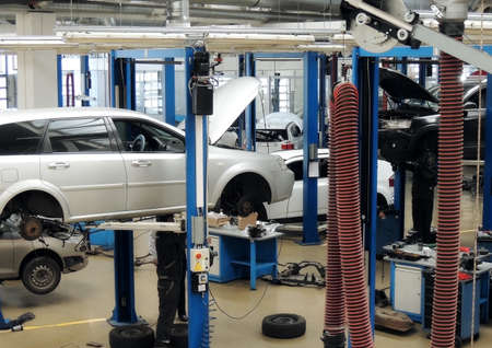 Vehicle On Lift At The Car Service Station Stock Photoのeditorial素材