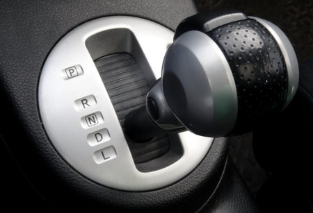 Mode controls and gear shift knob in sport car interior detailed