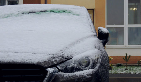 Car covered with snow and iceの写真素材