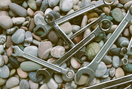 Steel Spanners On A Rocks In Old Film Style Stock Photo