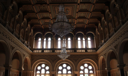 Columns support balconies in an ancient throne room with a carved ceilingの写真素材