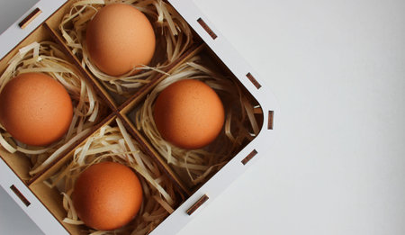 Easter Souvenir Box with Domestic Eggs On White Background Copy Space Image. Easter Symbols Stock...