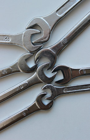 Work Cooperation Concept.  Shiny Chrome Hex Spanners Connected One With One Vertical Stock Photoの写真素材
