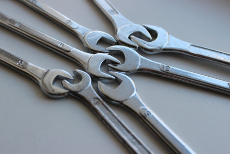 Connected open end wrenches isolated on white angle view stock imageの写真素材