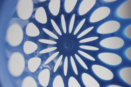 Glossy Surface With Holes In A Form Of Star And Variety Oval Holes Aroundの写真素材