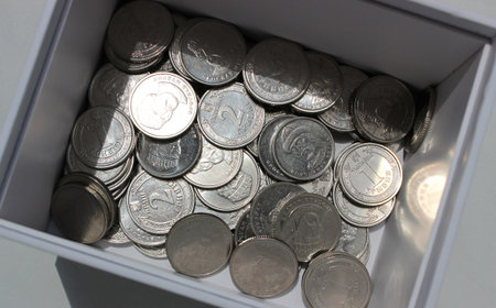 Heap Of Ukrainian Money In Coins At The Bottom Of White Box Closeup View Stock Photo