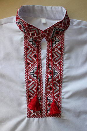 Collar of Ukrainian traditional handmade embroidery vyshyvanka shirt with red and black threads