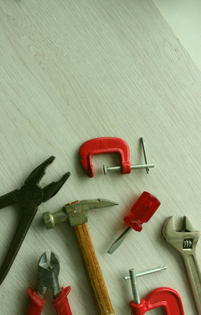 A well used mechanic tools in order on wood plank copy space stock imageの写真素材