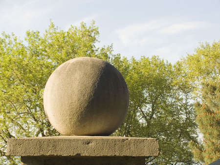 Small architectural detail in ancient park on a background of treesの写真素材
