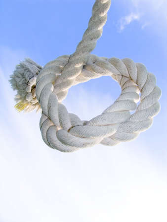 Unit from a rough cord on a background of the blue skyの写真素材