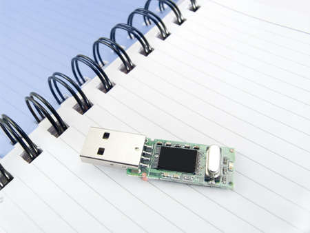 Page of a notebook with compactflash for storage of the informationの写真素材