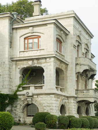 Old private residence with balconies in parkの写真素材