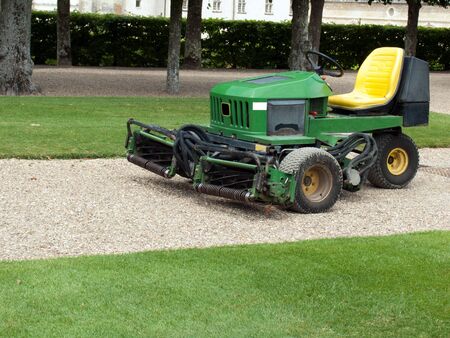 Machine for cutting of grass in the Parkのeditorial素材