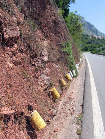 Mesh for protection against rockfall. Montenegro, summer.の写真素材
