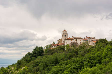 Mediterranean medieval town on a hill top, Moscenice, Istra, Croatiaの写真素材